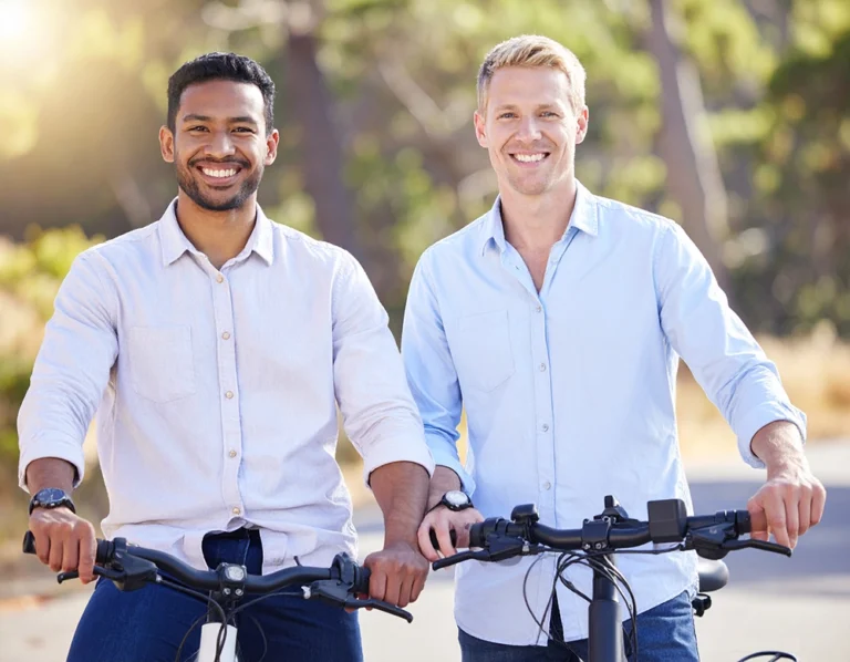 men standing smiling